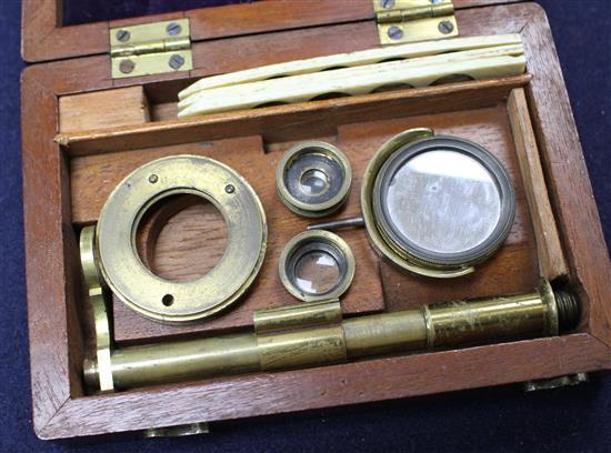 A Victorian mahogany cased brass pocket microscope
